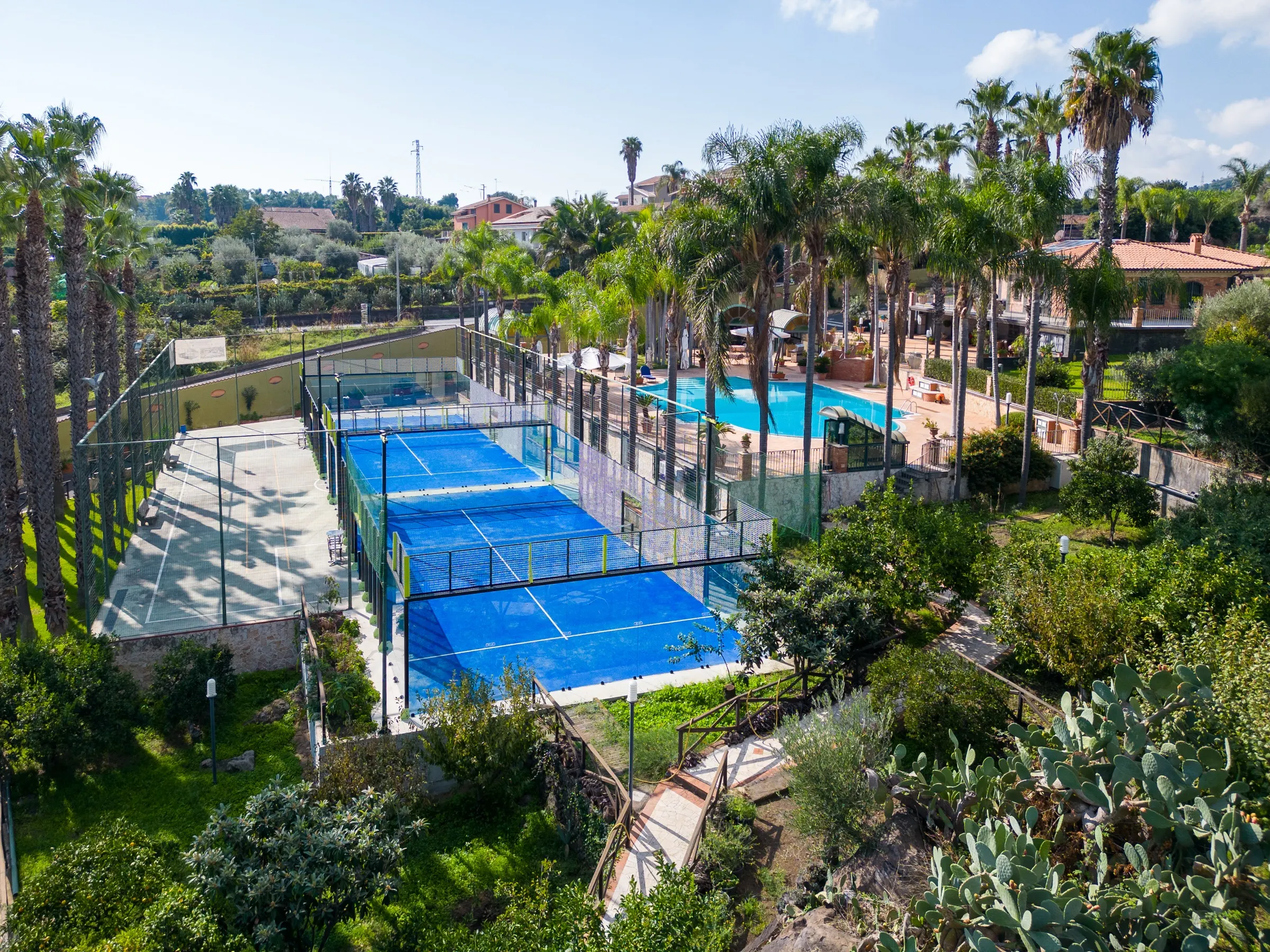 Drone view of the courts and the park
