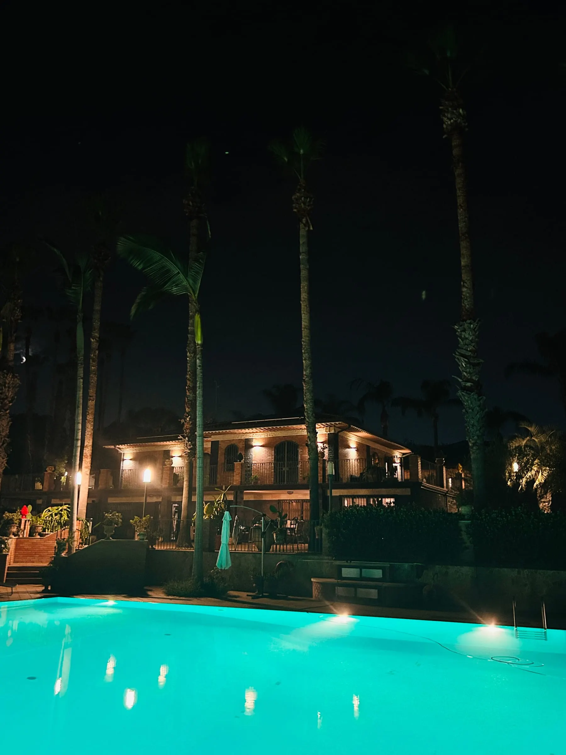 The pool lit up in the evening